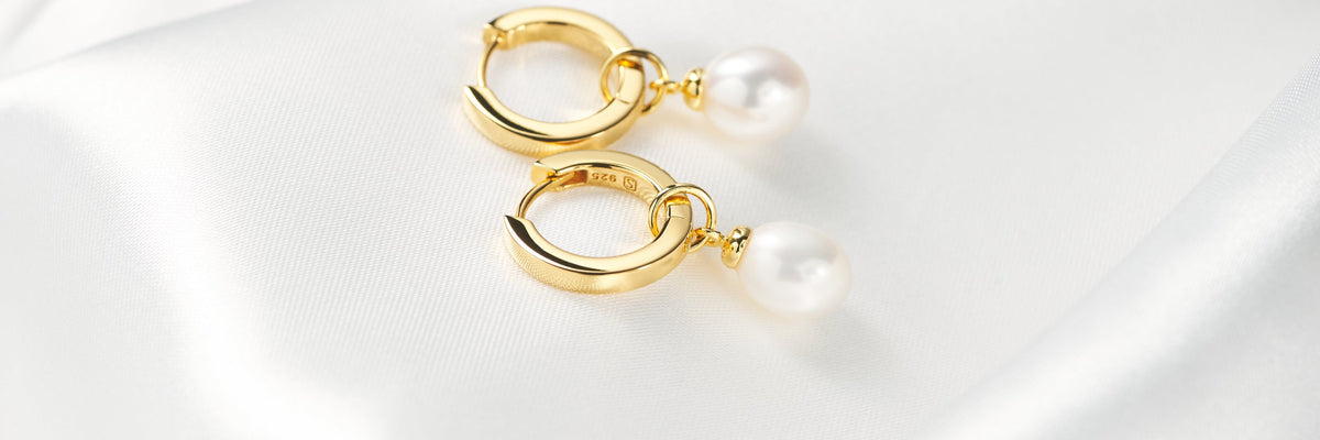 huggie hoop earrings with detachable pearl charms perfect for brides