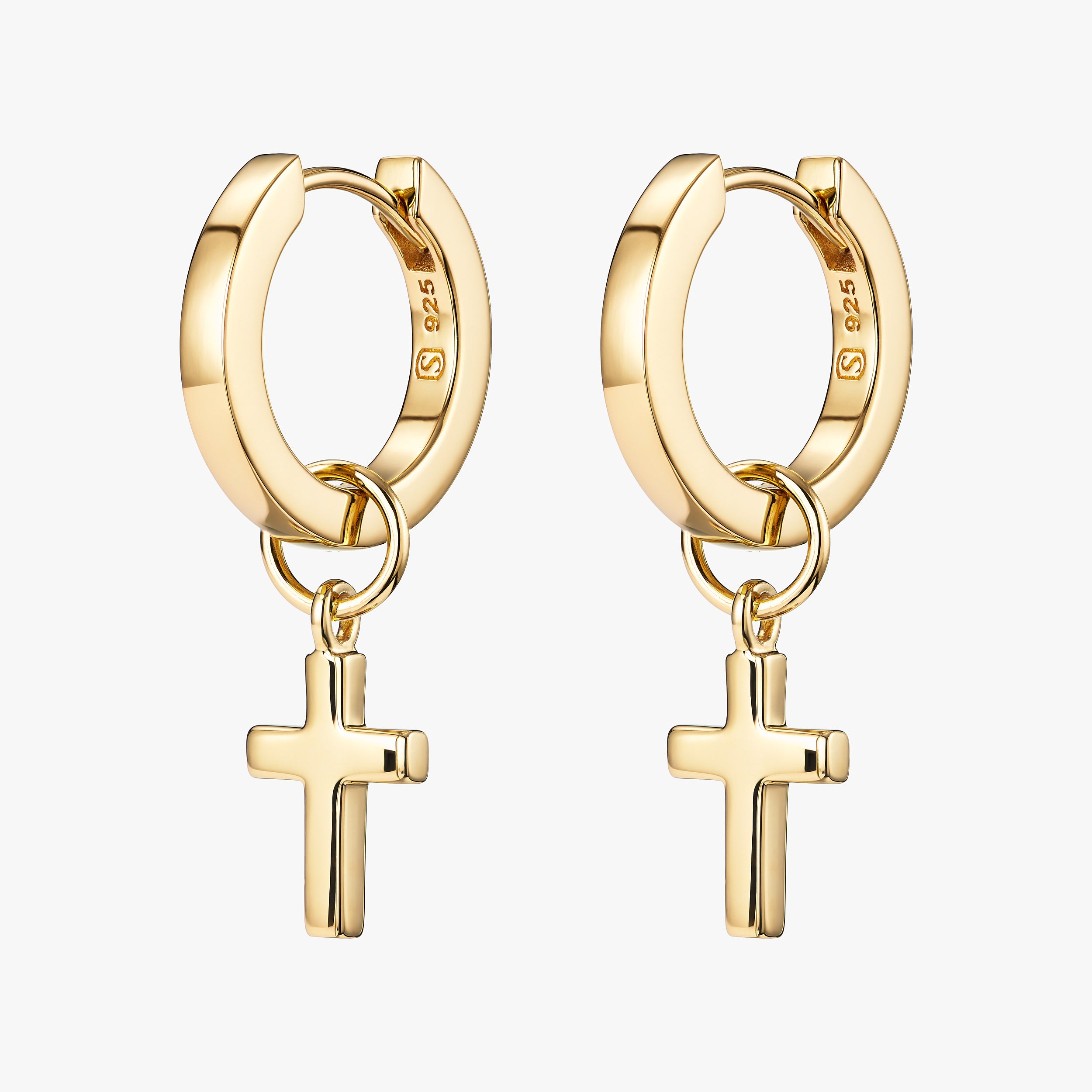 These elegant 18k gold vermeil cross earrings are a timeless symbol of faith and devotion. Crafted with a thick layer of 18K gold over sterling silver, it’s a sacred piece designed for everyday wear. Attached with interchangeable cross charms.