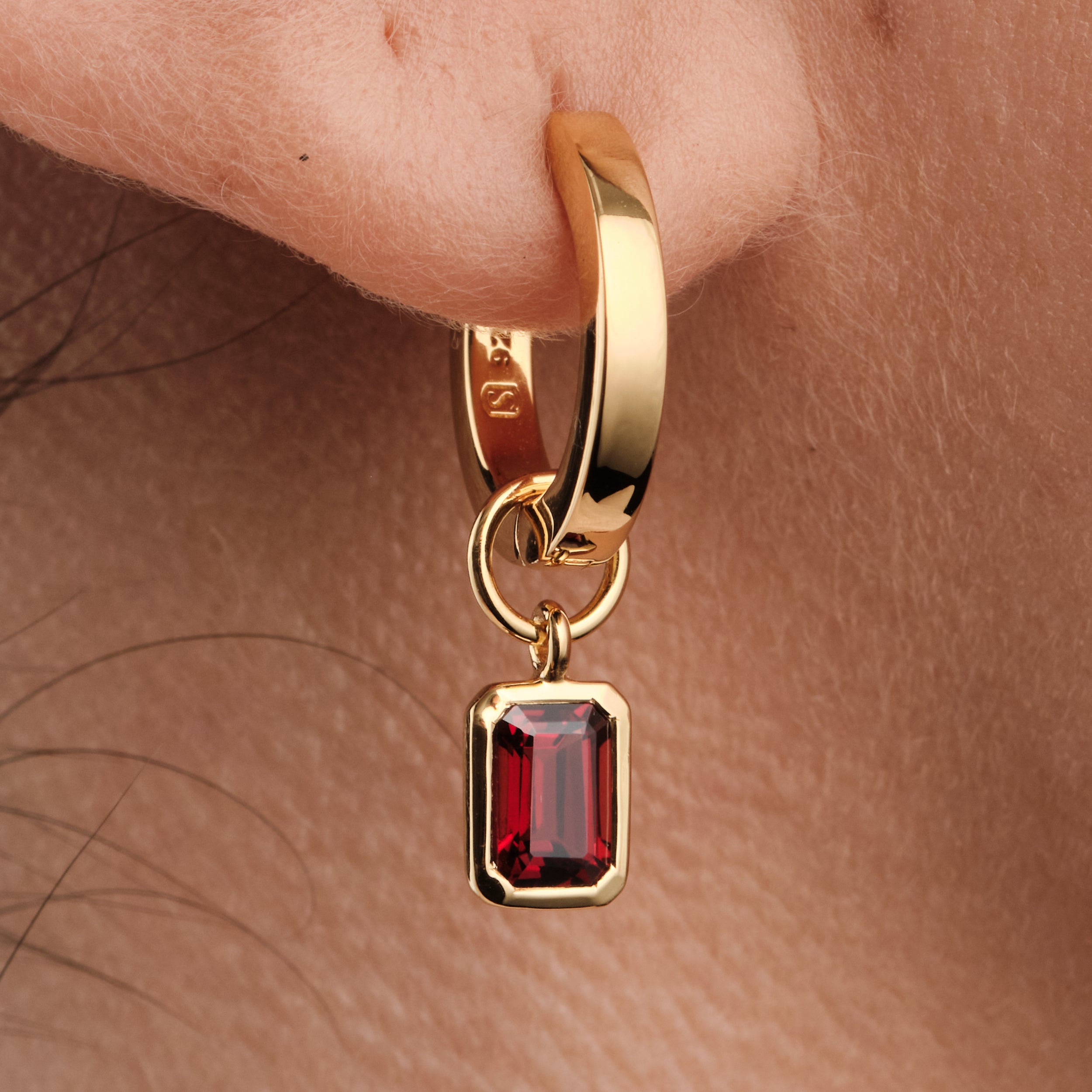 Signature Bold Huggie Hoop Earrings with Legacy Emerald-Cut Garnet Birthstone Charm