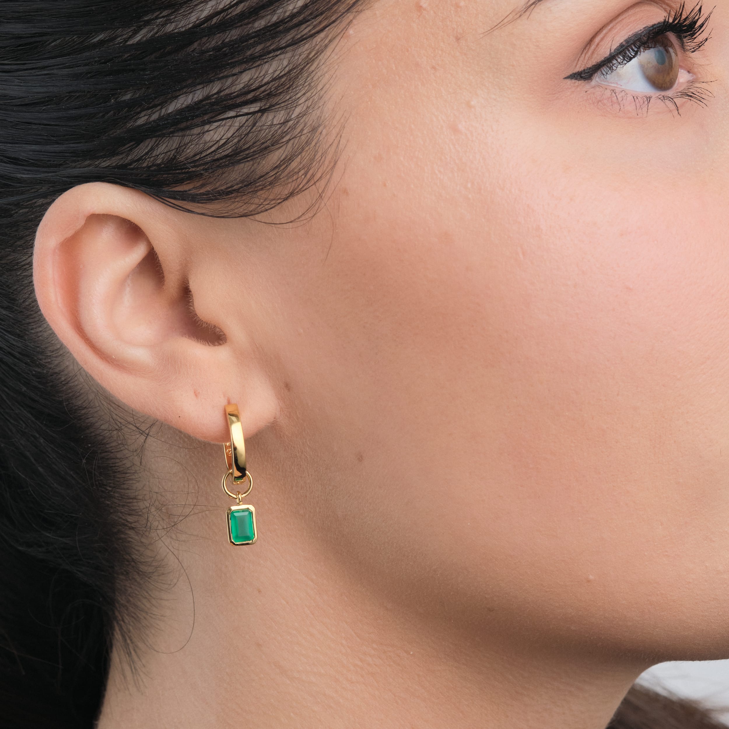 Green Onyx Gemstone Charms in 18k Gold Vermeil ring worn above view.