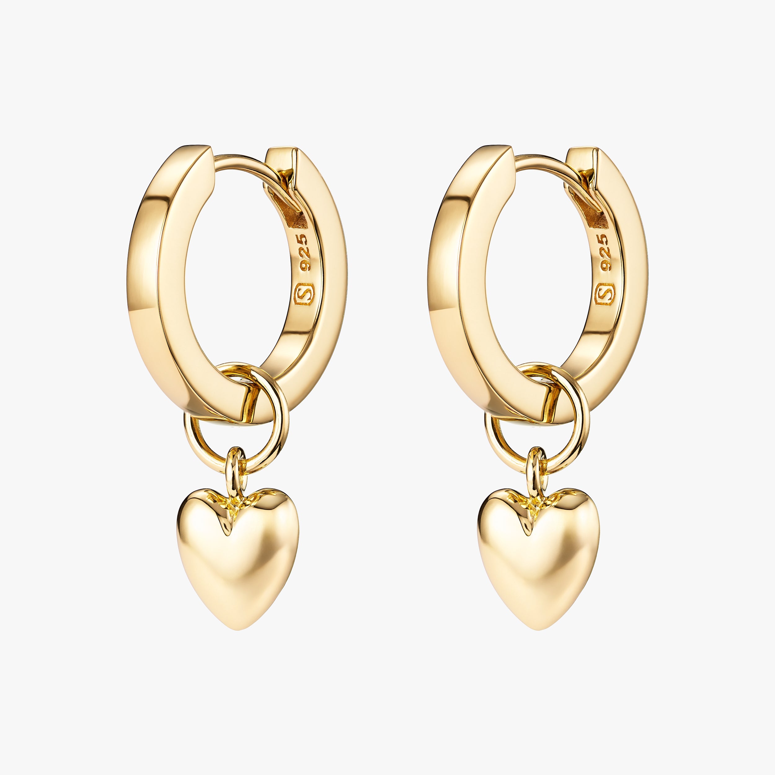 Puffy heart charm huggie hoop earrings in 18K gold vermeil, crafted from luxurious 18K gold vermeil, featuring interchangeable charms for personalised style. The perfect gift for any occasion.