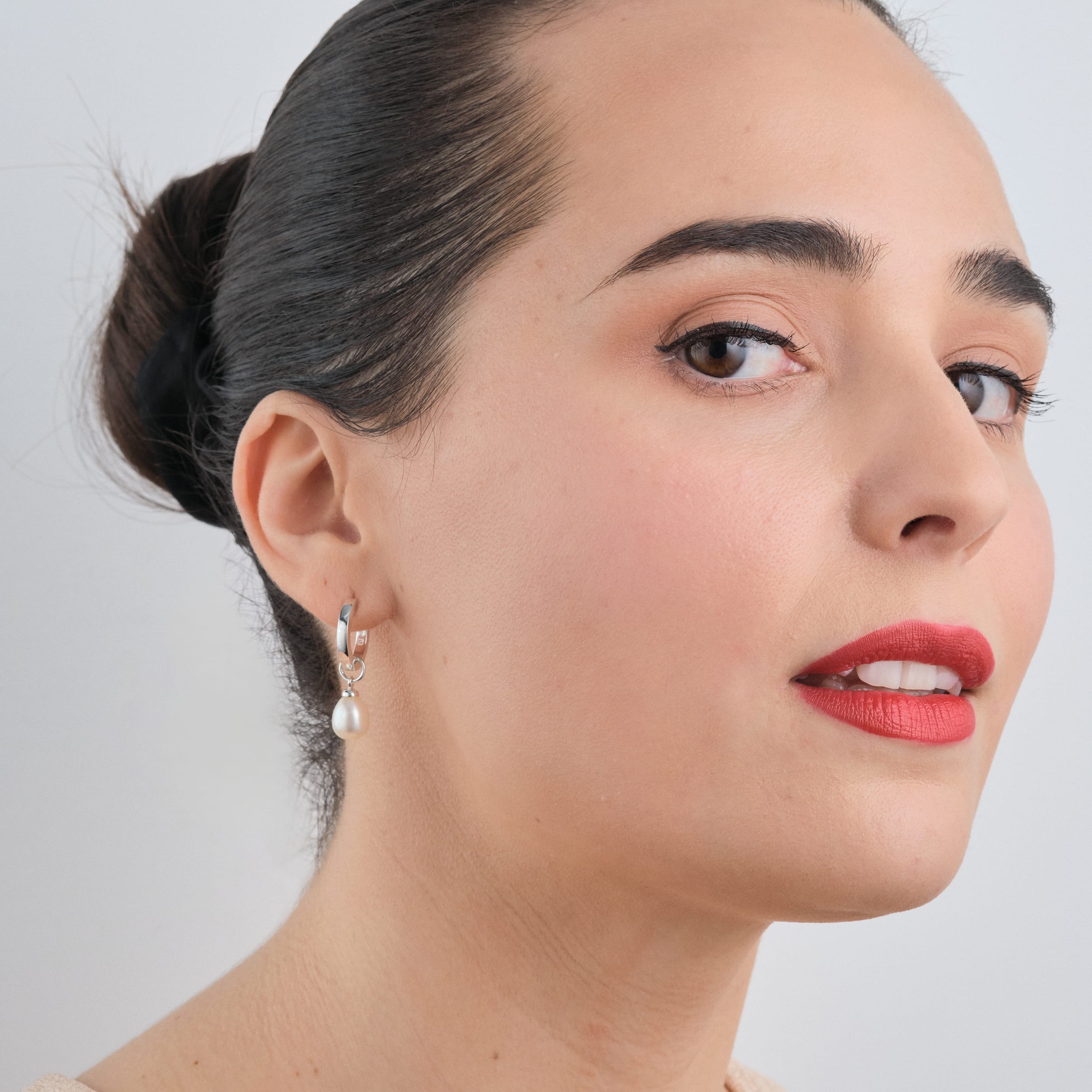 Sterling silver pearl charms hypoallergenic and elegant, these charms can be added to huggie hoop earrings and customised to create the perfect wedding accessory, offering timeless beauty and comfort for sensitive skin.