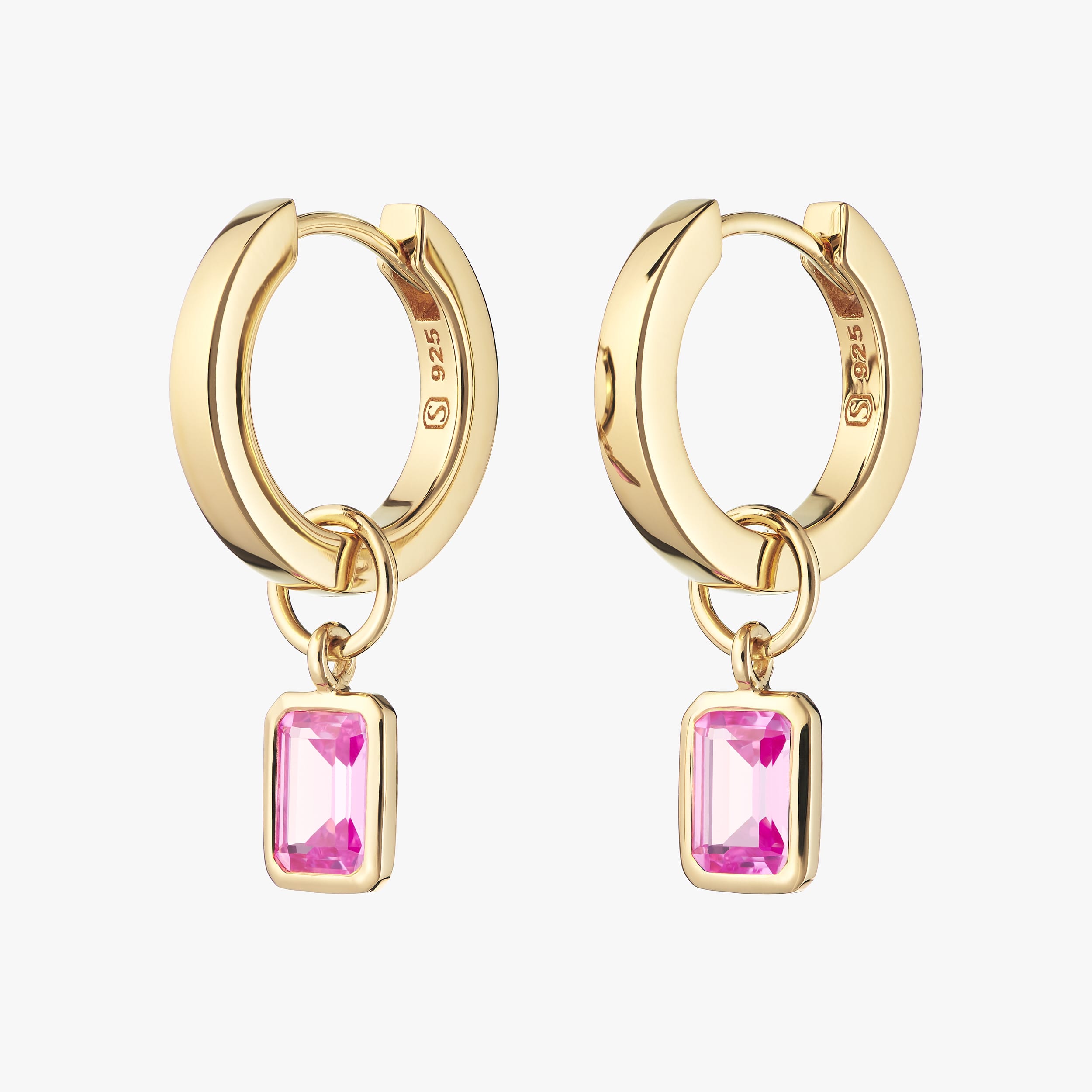 18K gold vermeil huggie hoop earrings with interchangeable pink ruby gemstone charms  a durable and affordable luxury, these earrings add a vibrant touch to any look. Crafted with high-quality gold vermeil for lasting wear and timeless elegance.
