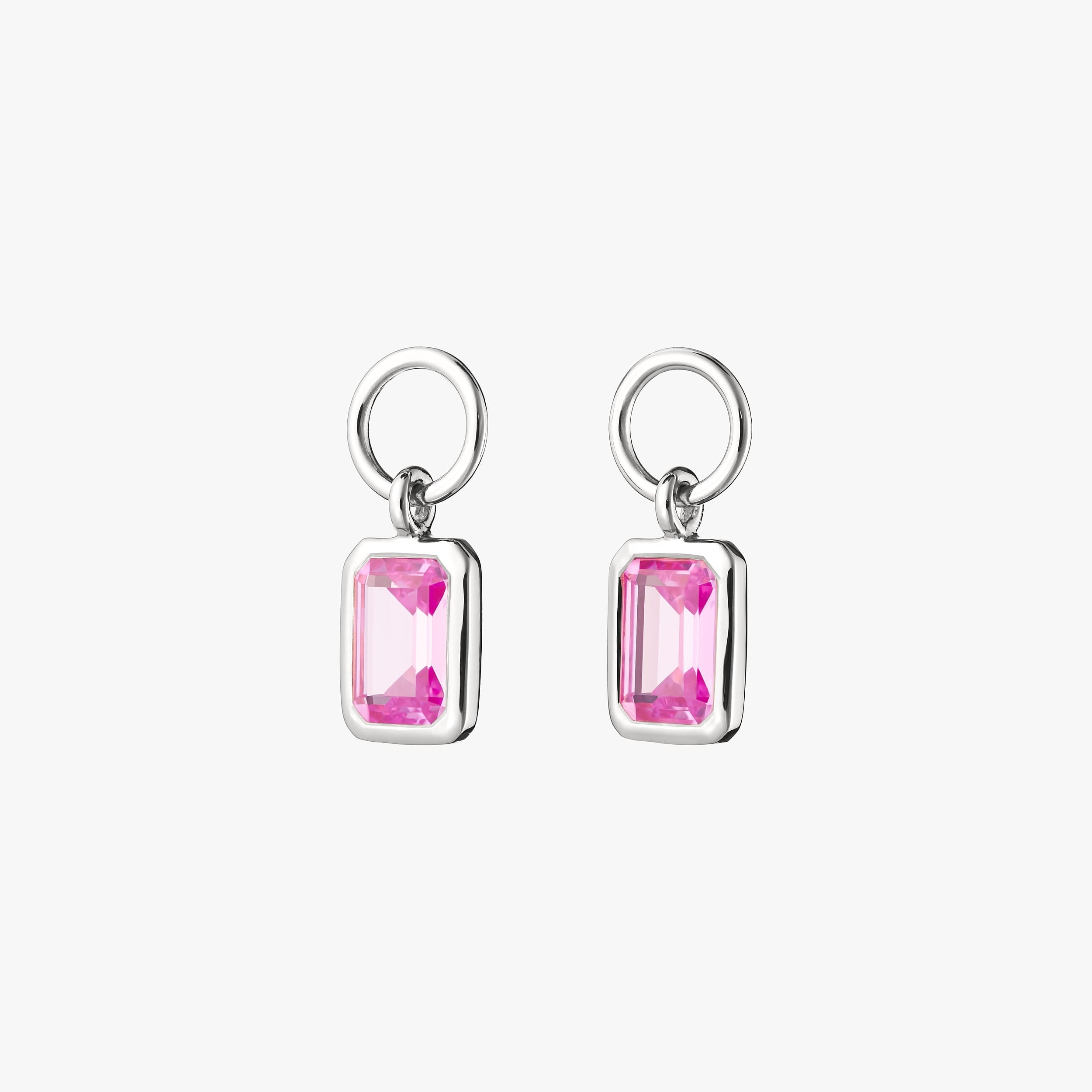 Pair of pink ruby gemstone charms encased in premium sterling silver. Perfect for attaching to huggie hoops, necklaces and bracelets.