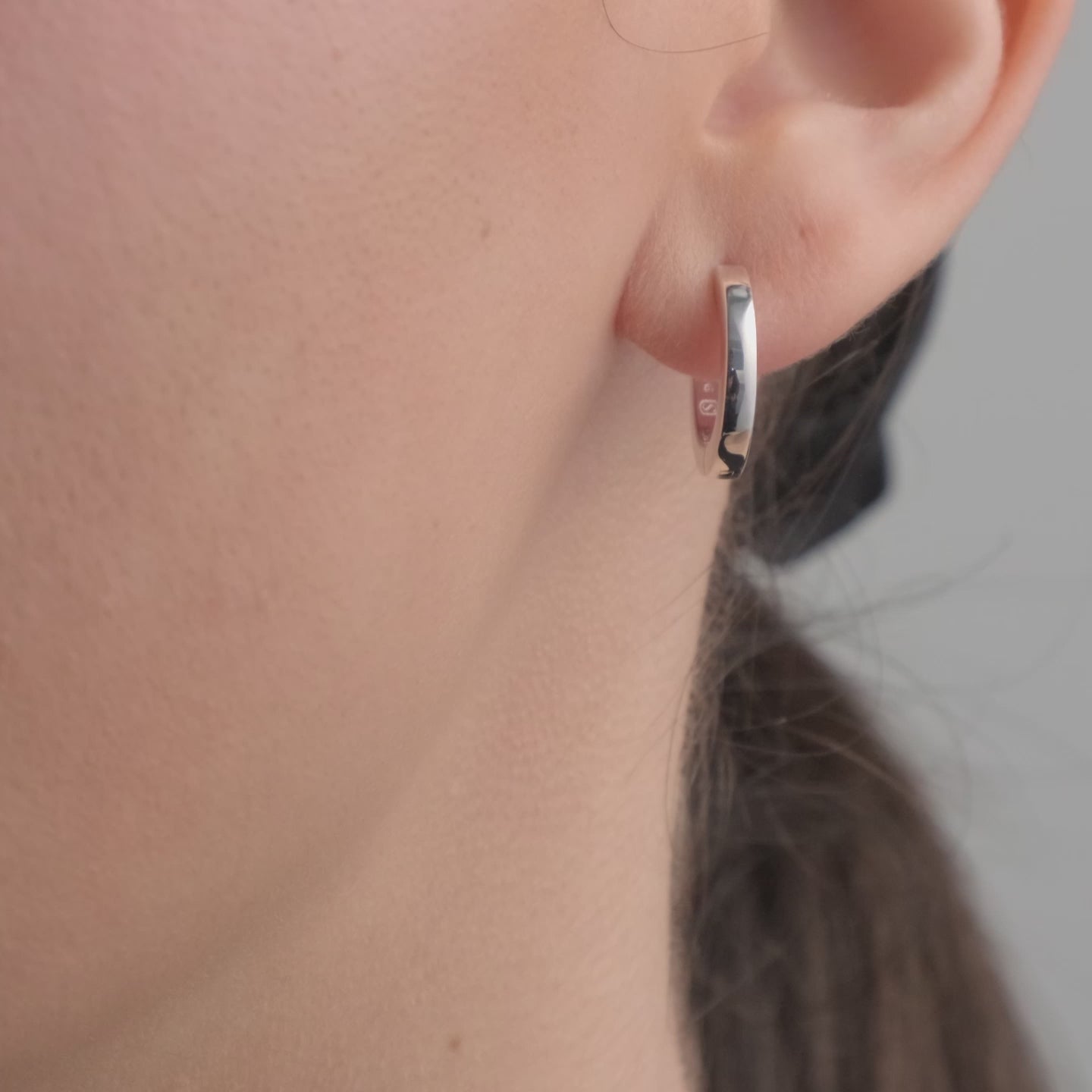 Huggie Hoops in Sterling Silver - Beautiful Sterling Silver Earrings video of a woman wearing them