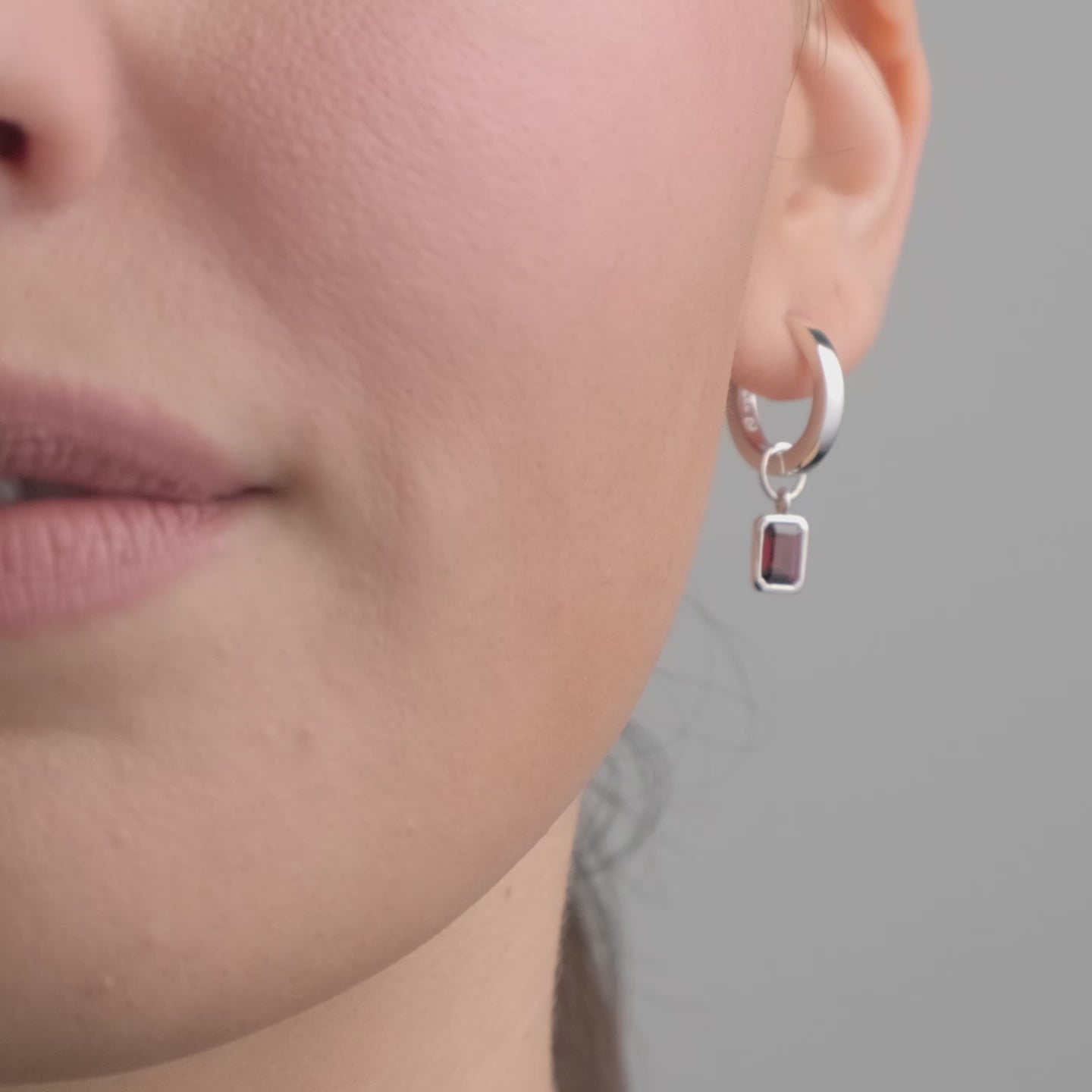 Red Garnet Huggie Set in Sterling Silver - Beautiful Silver Earrings video of a woman wearing them