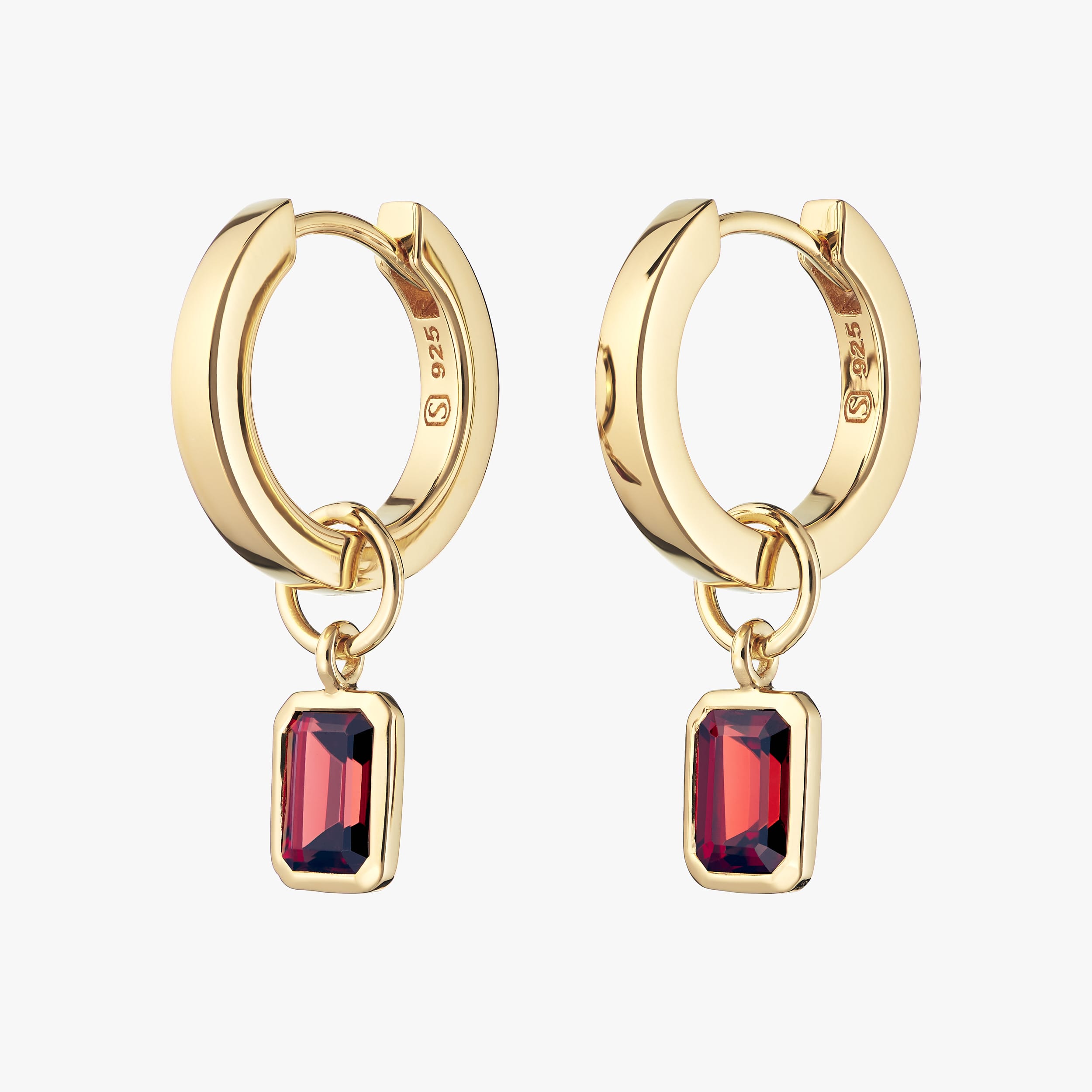 18K gold vermeil huggie hoop earrings with detachable red garnet gemstone charms which featuring the fiery red garnet, January’s birthstone, these durable yet affordable earrings are a timeless and customisable accessory.