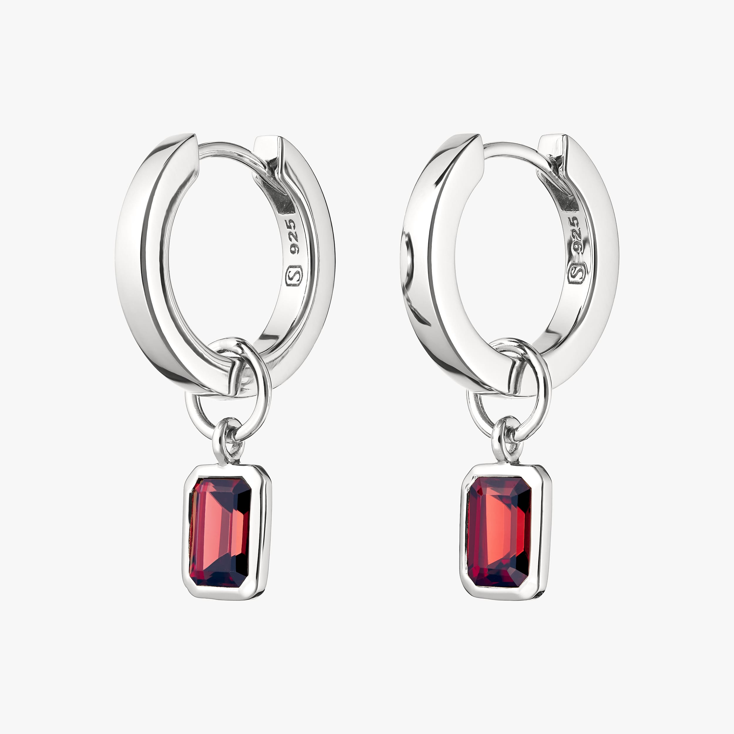 Sterling silver huggie hoop earrings with interchangeable red garnet gemstone charms featuring the rich, deep red garnet, January's birthstone, set in hypoallergenic sterling silver. Perfect for customising earrings, necklaces, or bracelets, offering a luxurious, affordable touch.