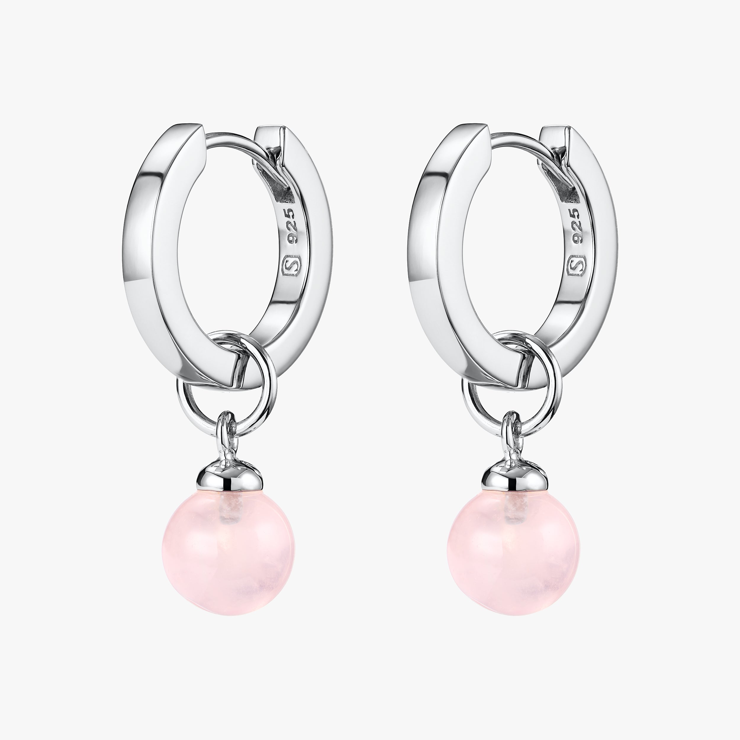 Elegant Sterling Silver Huggie hoop earrings with interchangeable Rose Quartz gemstone charms attached.