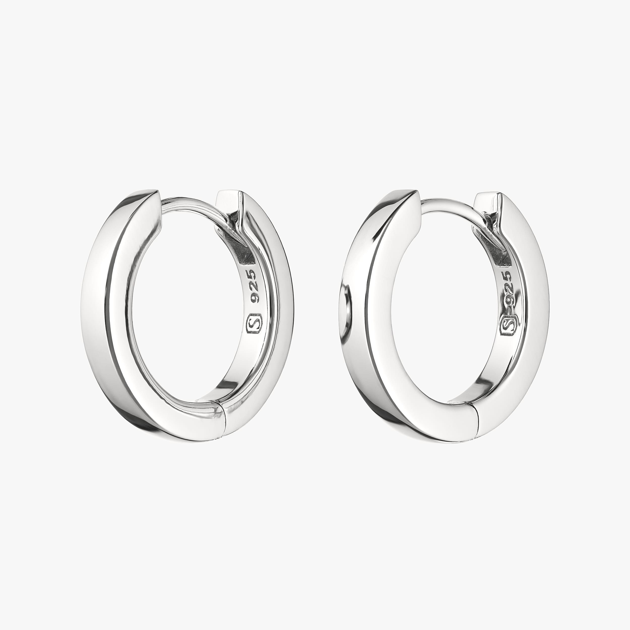 Sterling silver huggie hoop earrings. Durable, hypoallergenic, and nickel-free for everyday wear. Tarnish-resistant and perfect for sensitive ears.
