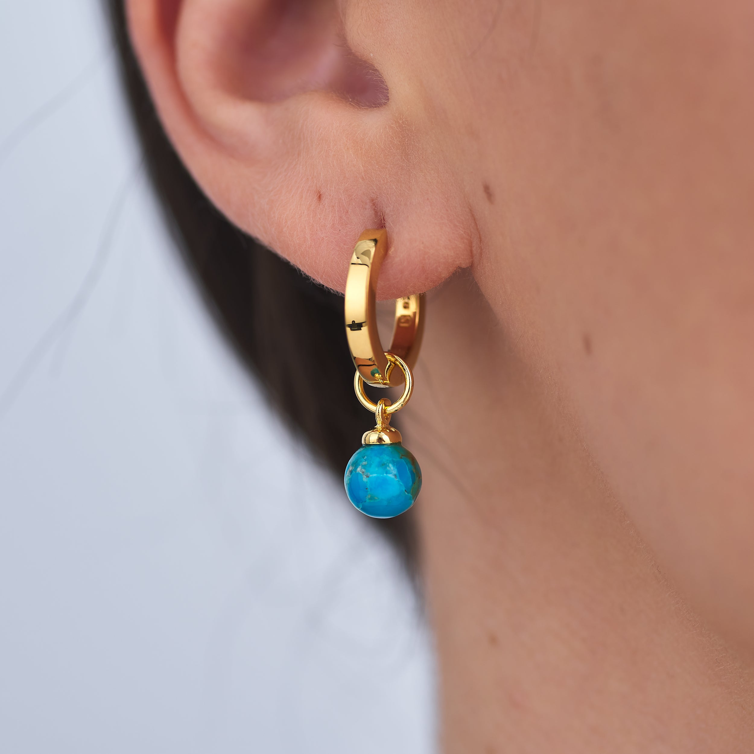 Classic 18k Gold Vermeil Huggie hoop earrings with stunning Turquoise gemstone charms that are interchangeable.