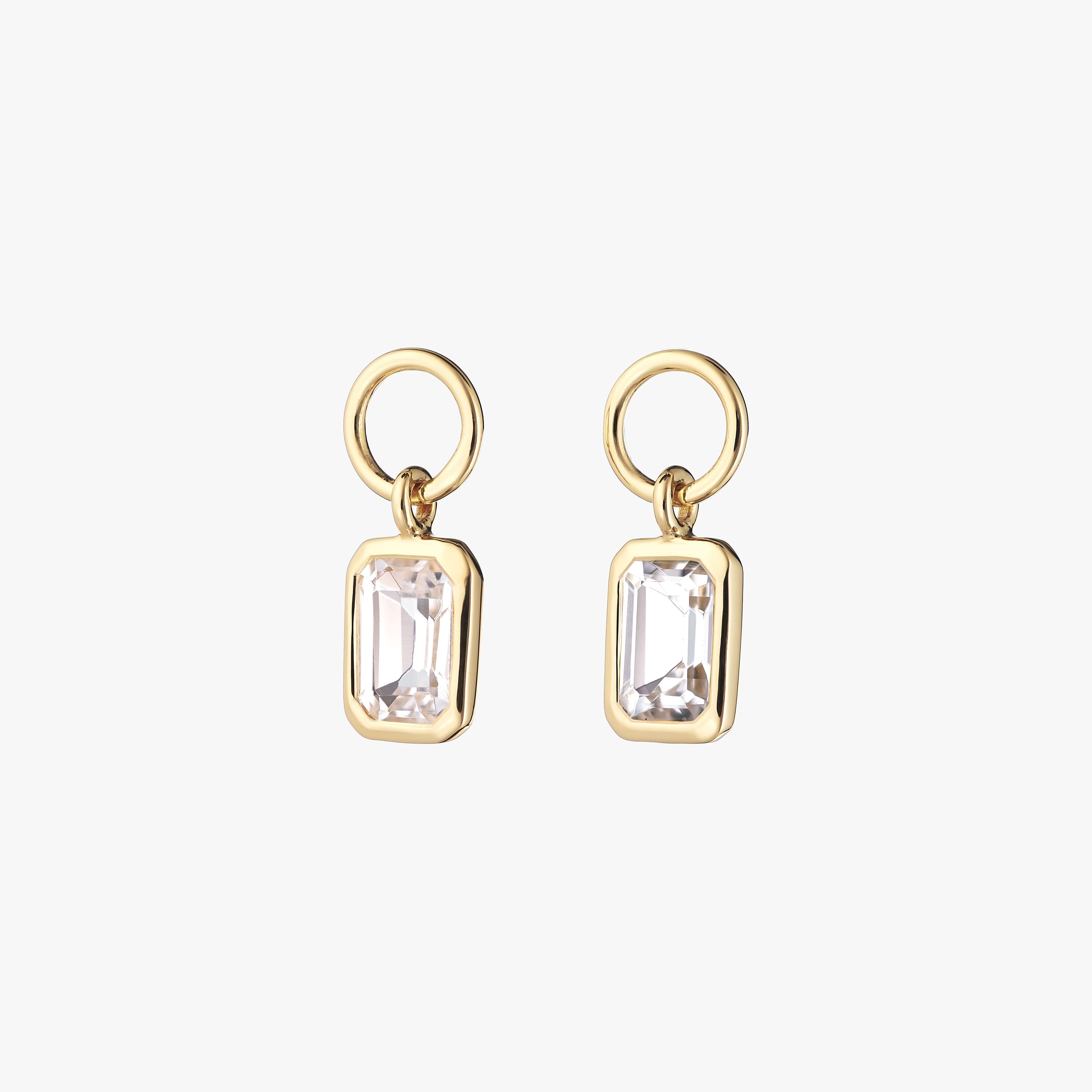 Pair of beautiful white topaz gemstone charms encased in luxurious 18k gold vermeil. The perfect addition to any huggie hoop, necklace or bracelet for ultimate customisation.
