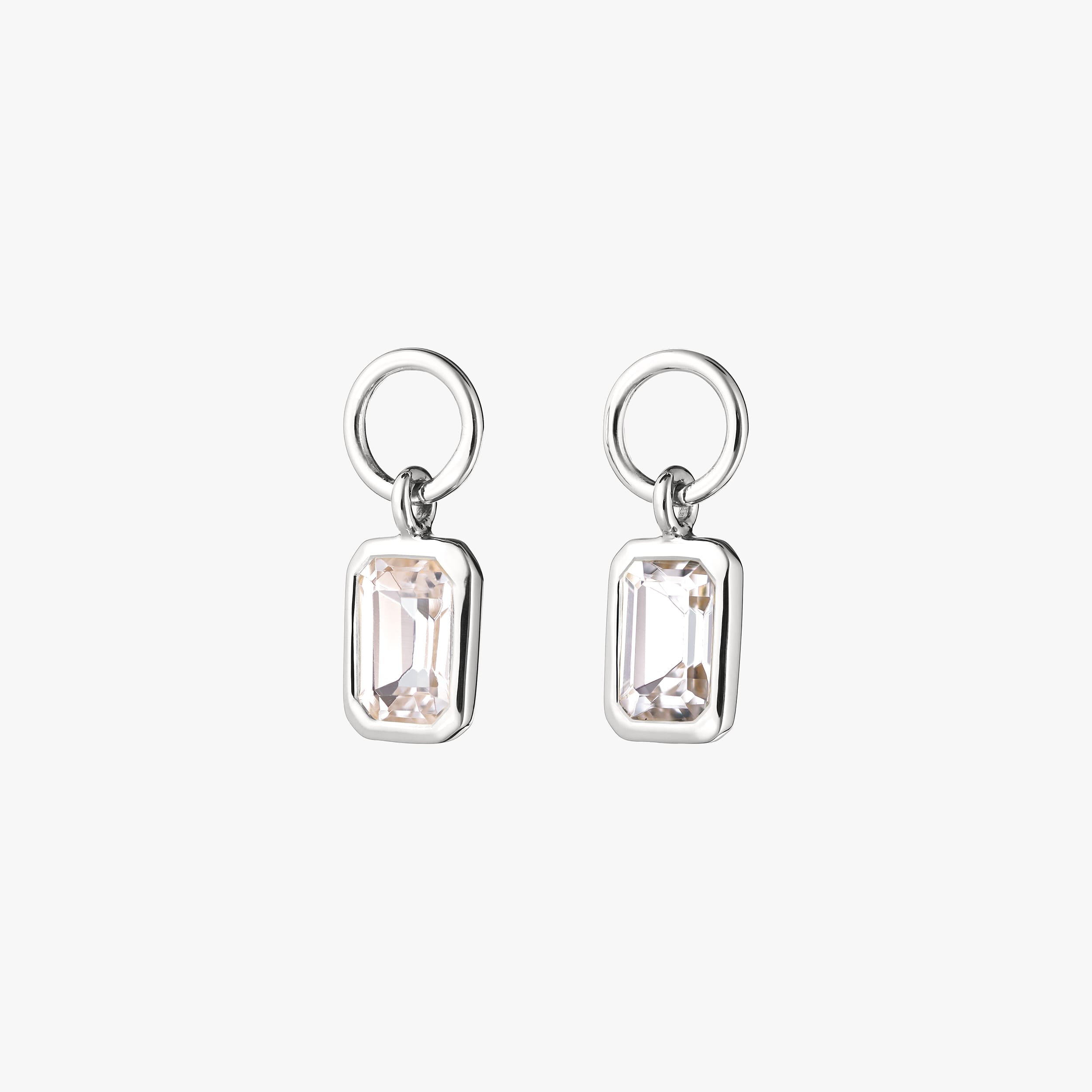 Pair of sparkling luxurious white topaz gemstone charms in 925 sterling silver the perfect fit for customising any huggie hoops, necklace or bracelet.